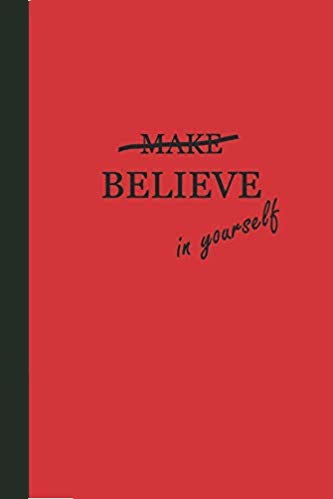 Red journal with black text that says BELIEVE in yourself. The word MAKE is crossed out above the word believe.