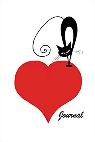 White softcover notebook with a black cat standing on a red heart. Black text says journal.