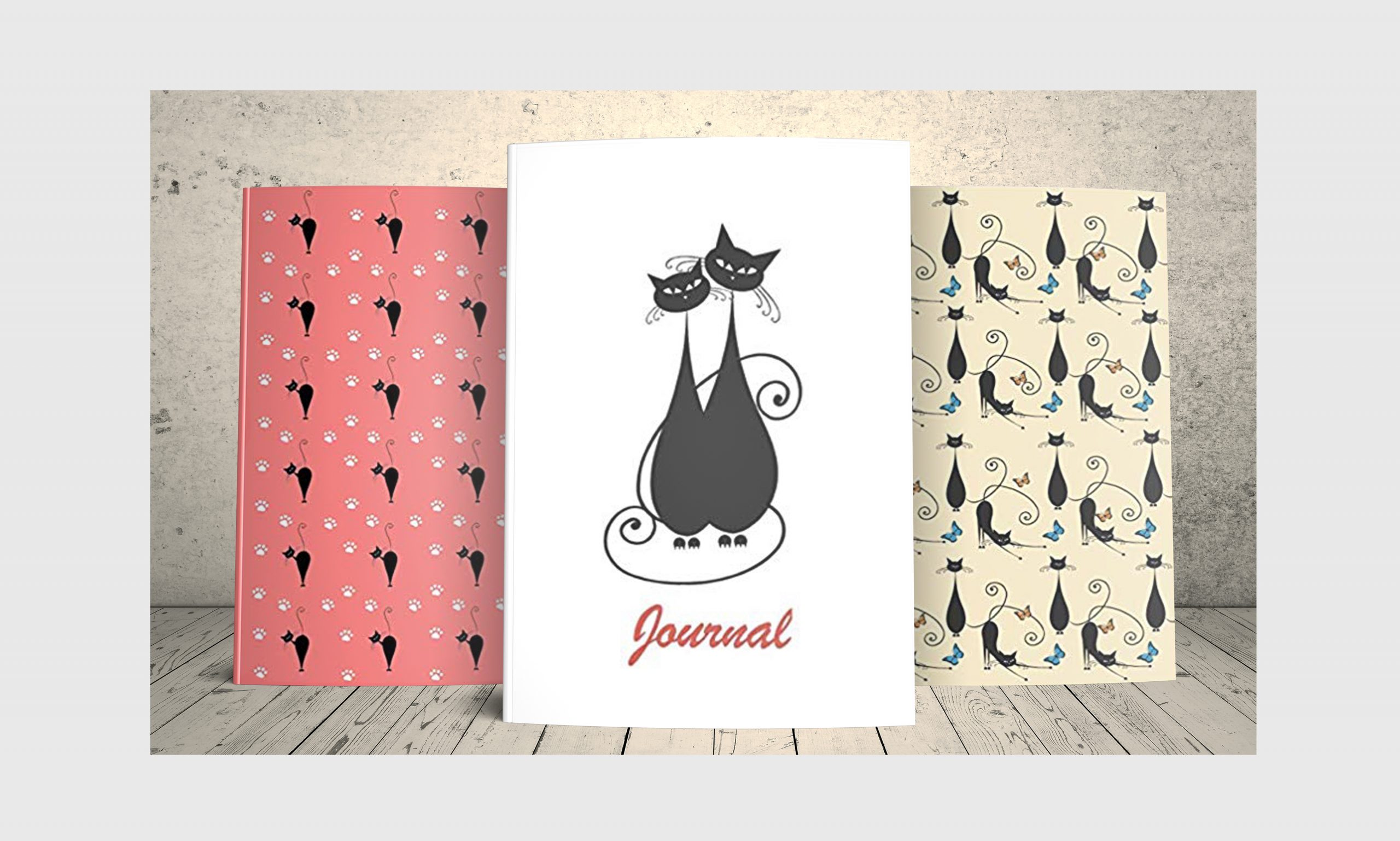 Three journals with black cats on the cover.