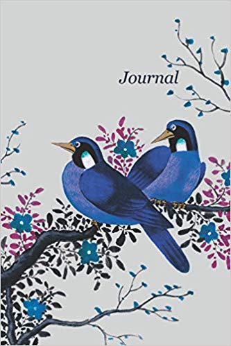 Softcover writing journal with beautiful blue birds on a branch. Black text that says Journal.