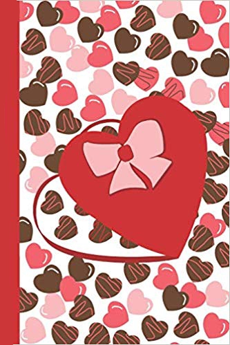 Journal with red, pink and chocolate brown hearts and a red heart shaped candy box with a pink bow.