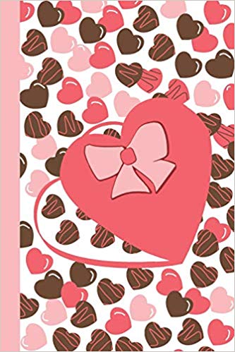 Journal with pink and chocolate brown hearts and a large pink heart shaped candy box with a pink bow.