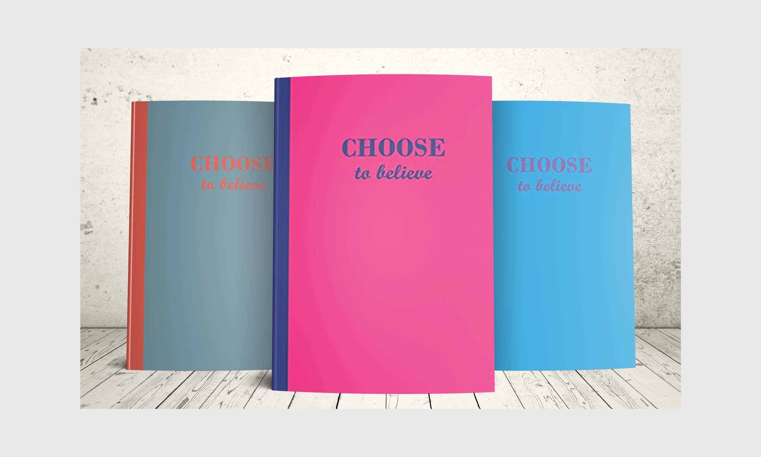 Three Choose to believe journals with covers in blue and orange, pink and blue and blue and purple.