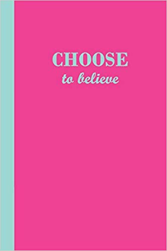 Pink journal with the motivational phrase Choose to believe in aqua blue text.