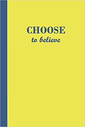 Yellow journal with the motivational phrase Choose to believe in blue text.