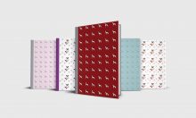 Five journal notebooks with different dogs on the cover; pugs, greyhounds and a dachshund.