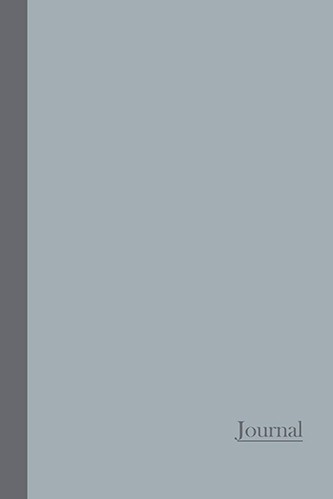 Grey notebook with the word journal on it. Cover text is in a lighter shade of grey.