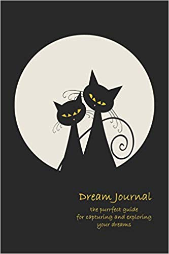 Dream journal with two black cats sitting in front of a white circular moon. Yellow text says Dream Journal: the perfect guide for capturing and exploring your dreams.
