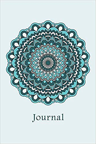 Notebook with blue mandala and the word journal on the cover