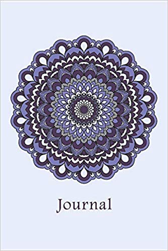 Notebook with purple mandala and the word journal on the cover