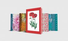 Five journals with floral designs.