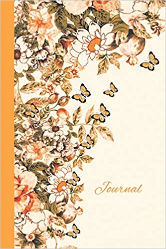 Yellow and Gold notebook with flowers and butterflies. Gold text says journal.