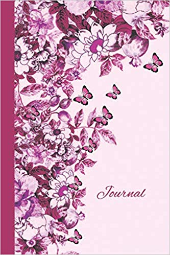 Pink notebook with flowers and butterflies. Pink text says journal.