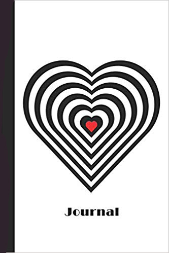 Journal notebook with black, white and red heart on the cover and the word journal in black text.