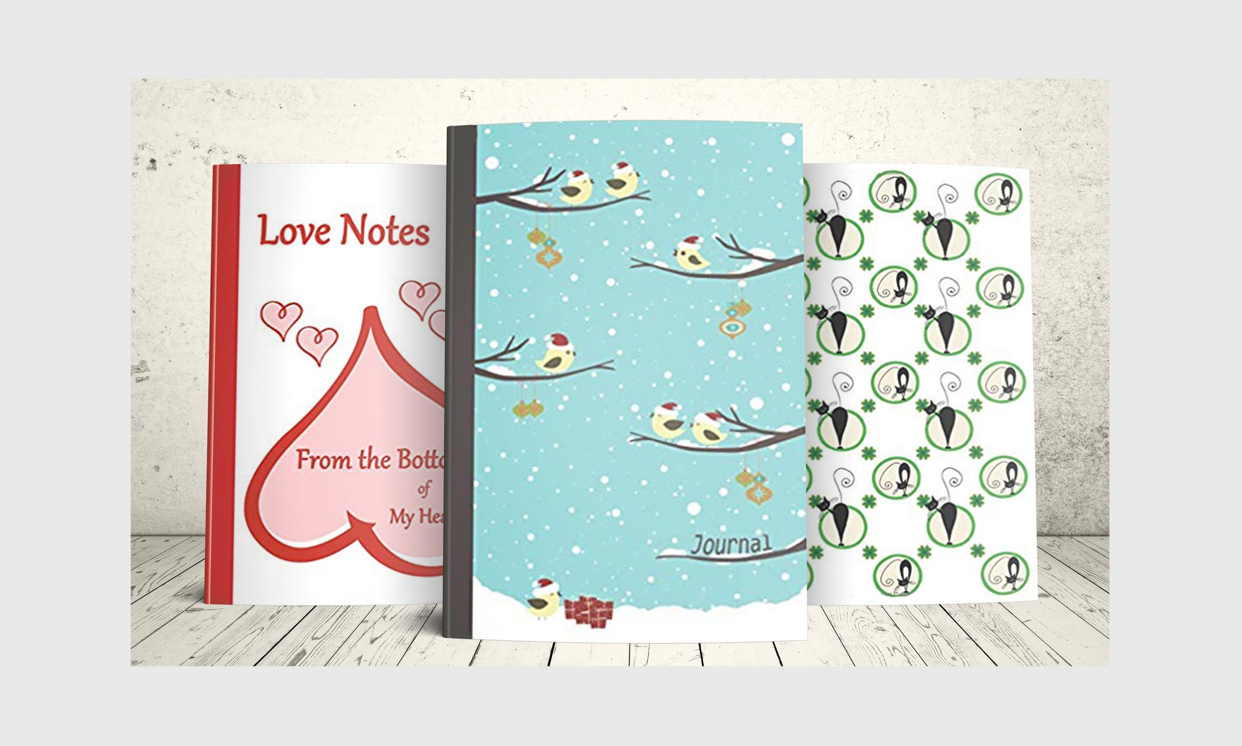 Three holiday journals, Love notes for Valentine's Day, Christmas Birds and Black Cats with Shamrocks for St. Patrick's Day.
