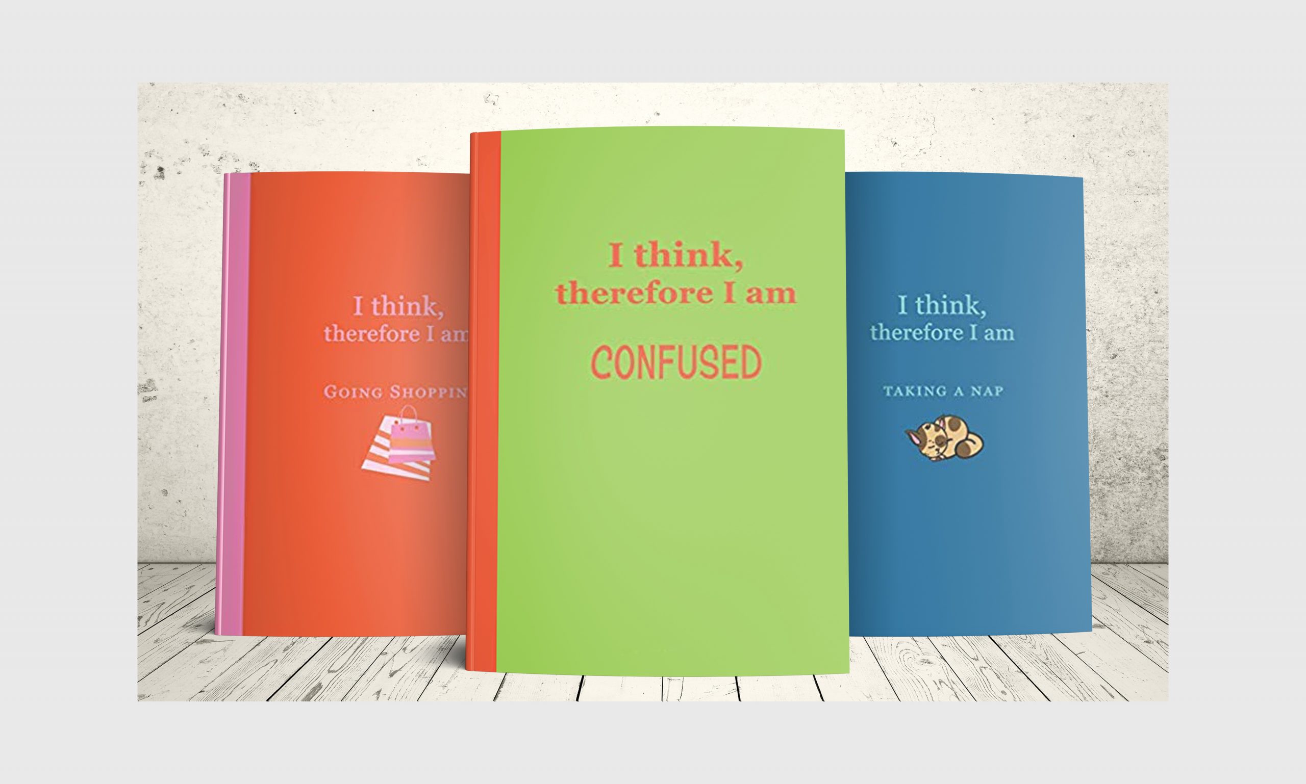 Three softcover journal notebooks that say I think therefore I am.