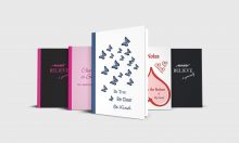 Five journal notebooks with motivational sayings on the cover.