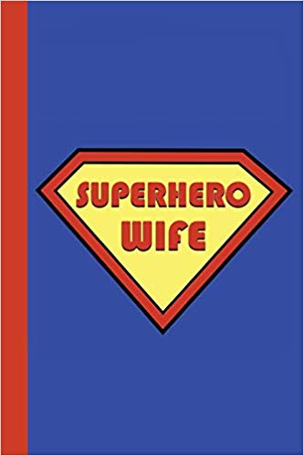 Superhero journal in red and yellow on a blue background. Red text that says Superhero Wife.