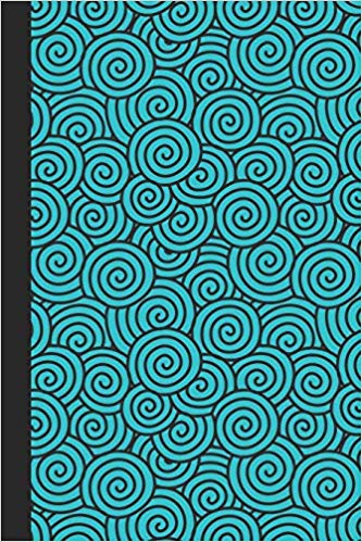 Teal blue and black journal with swirls on the cover.