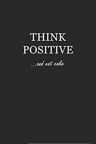 Softcover black writing journal with white text that says: Think Positive... and eat cake