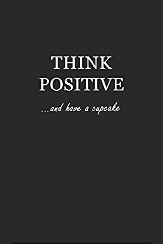 Softcover black writing journal with white text that says: Think Positive... and have a cupcake