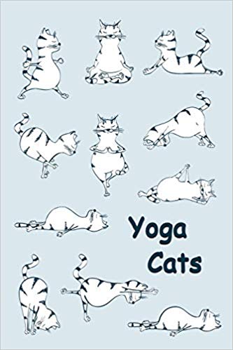 Blue and white journal with cats doing yoga on the cover. Dark blue text says yoga cats.