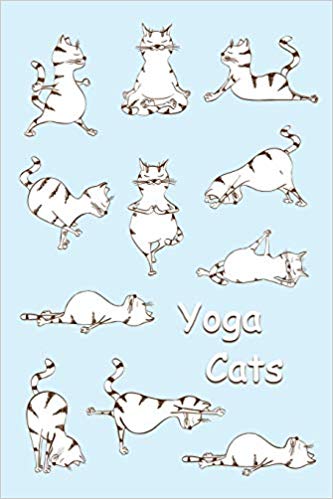 Blue and white journal with cats doing yoga on the cover. White text says yoga cats.